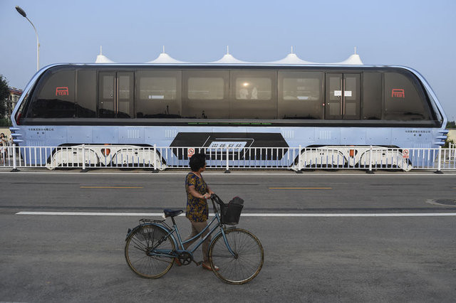 Çin'in 300 kişilik dev otobüsü sınıfta kaldı - Sayfa 1